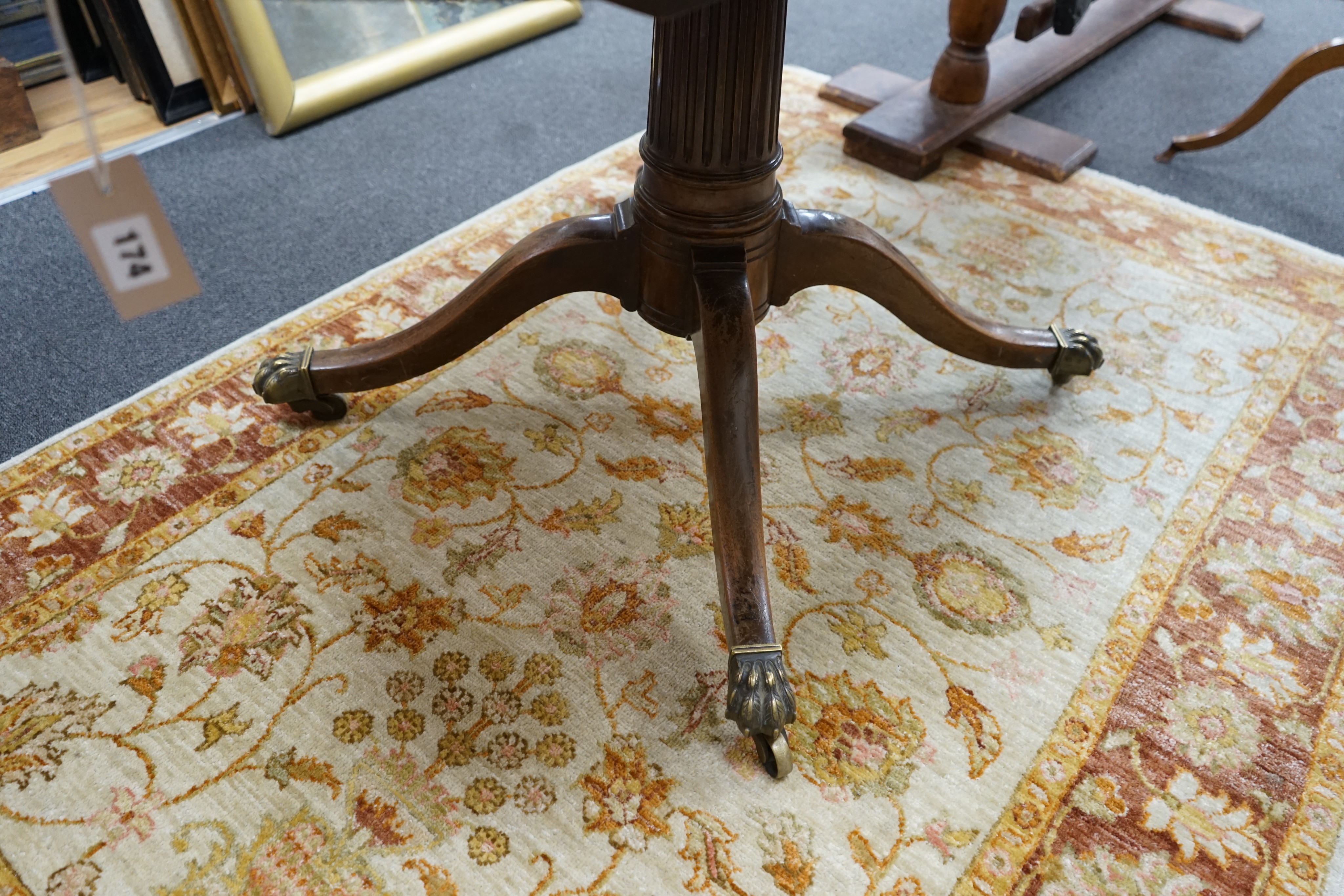 A small George III style oval mahogany extending dining table, (no leaves) width 126cm, depth 91cm, height 77cm